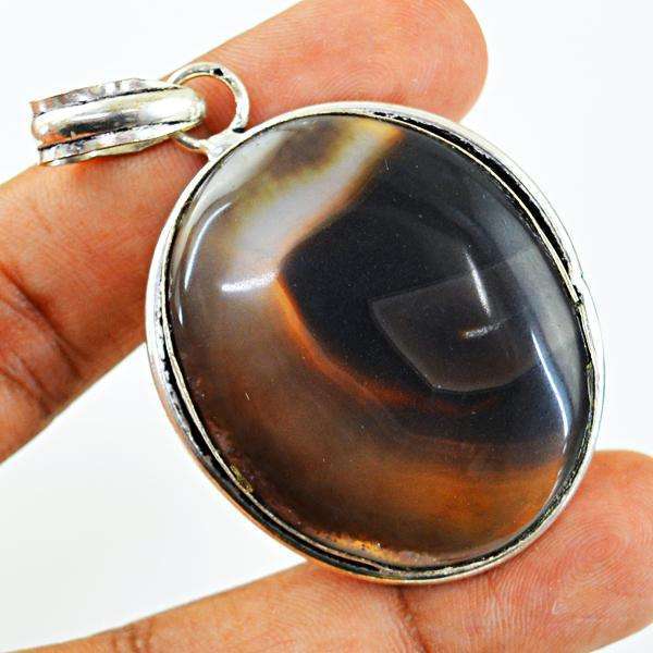 gemsmore:Amazing Natural Oval Shape Onyx Tibet Silver Pendant