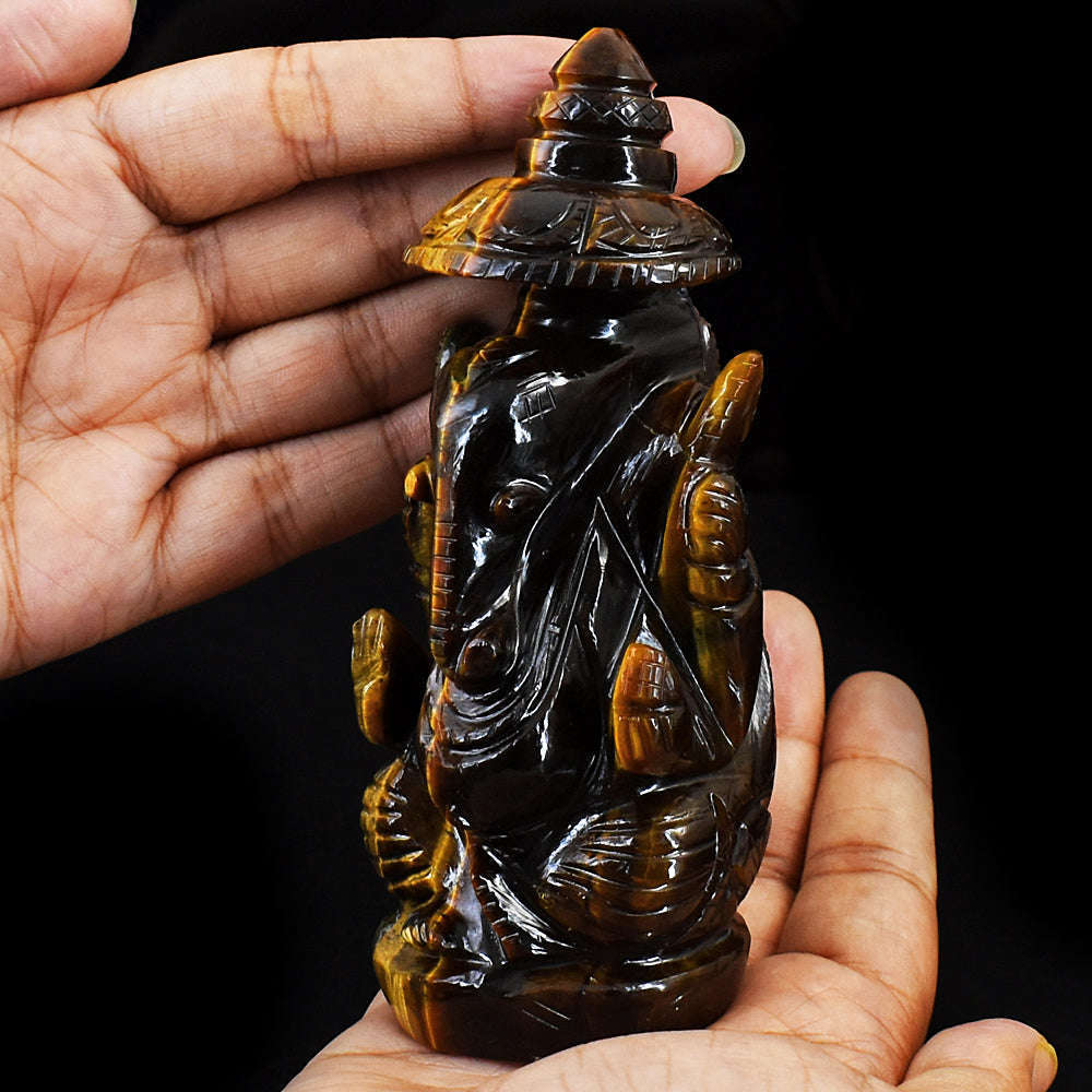 gemsmore:Artisian Hand Carved Golden Tiger Eye Ganesha With Throne
