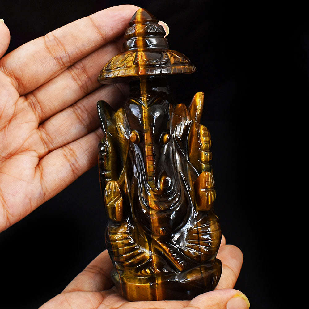 gemsmore:Artisian Hand Carved Golden Tiger Eye Ganesha With Throne