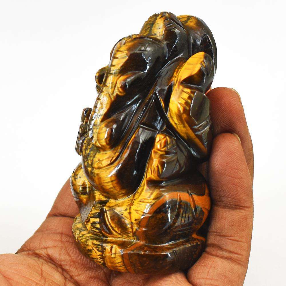 gemsmore:Craftsmen Hand Carved Golden Tiger Eye Lord Ganesha Idol