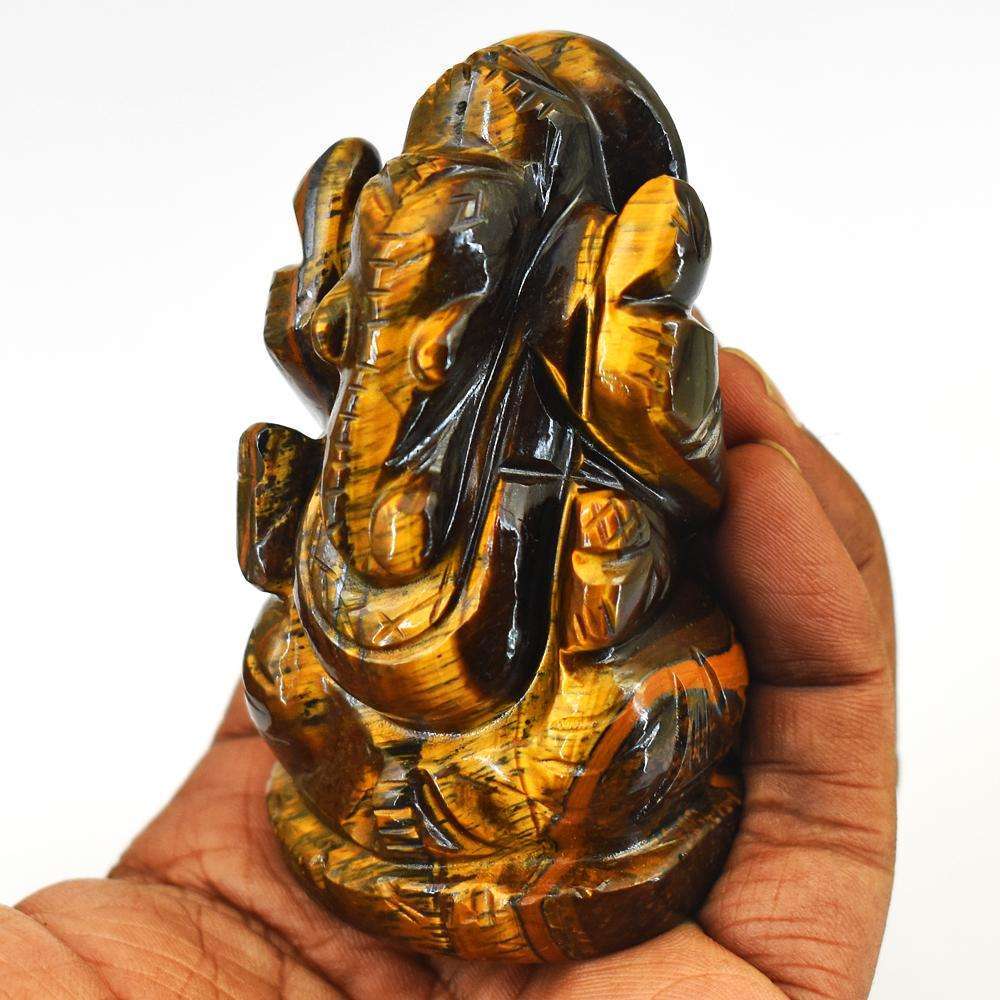 gemsmore:Craftsmen Hand Carved Golden Tiger Eye Lord Ganesha Idol