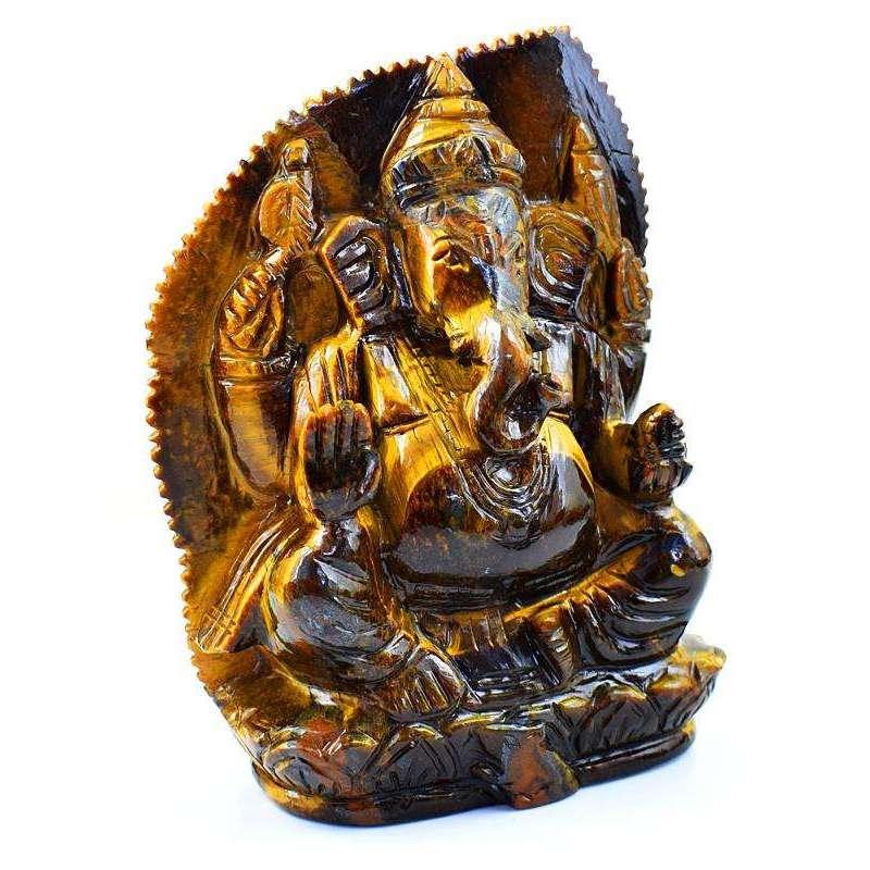 gemsmore:Hand Carved Golden Tiger Eye Ganesha With Leaf At Back