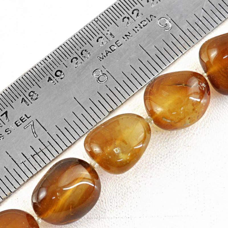 gemsmore:Natural Brown Onyx Drilled Beads Strand