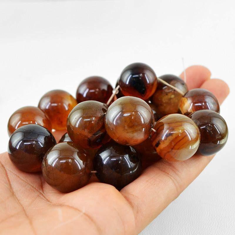 gemsmore:Natural Drilled Brown Onyx Round Shape Beads Strand