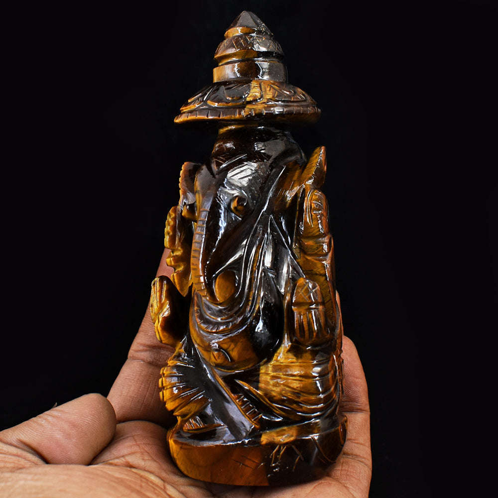 gemsmore:Natural Hand Carved Golden Tiger Eye Ganesha With Throne