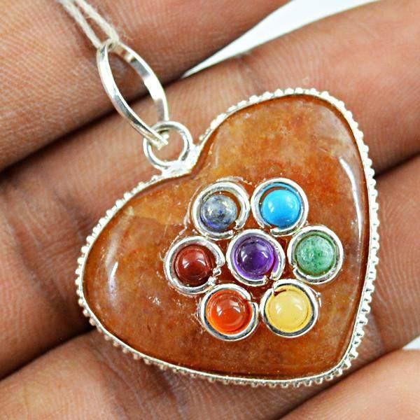 gemsmore:Natural Orange Aventurine Carved Seven Chakra Pendant